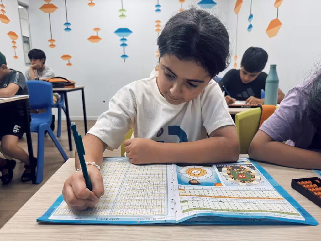 Primary school student practising speed writing exercise in SIP Abacus classroom New Zealand